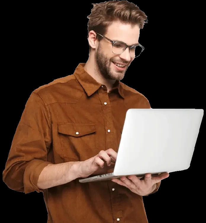 Young cheerful man with a laptop